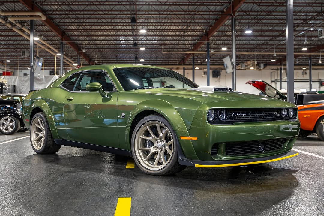 In Inventory now || 2023 Dodge Challenger Last Call Scat Pack Swinger 
Special Edition Collector owned BRAND NEW CAR ONLY 20KMs
Never Street driven, dealer plastic still on seat!
6.4 litre Hemi V8/ 6 Speed Manual
485 Horsepower/ 475 lb-ft torque
F8 Metallic Green with Black interior
This package, also known as the Scat Pack Swinger package, is inspired from the brands Muscle Car history from the 60's and 70's includes the following features.
Gold School "Challenger" Grille Badge 
Gold School Painted SHAKER Hood Scoop
Gold School Scat Pack/ Bee Rear Spoiler Badge
Retro green side stripe
Swinger Exterior Vinyl Graphics 
20x11 Inch Gold School Wheels 
Monochrome Bee Fender Badge 
Gold School Wide R/T Grille Badge 
Wood Grain Textured Aluminum Bezels 
Swinger IP Badge 
Nappa Leather -Trimmed Alcantara seats with Green stitching
Basil Green IP/Console/Door Interior Accent Stitching 
White -faced Gauges 
$99,900 CAD or $77,949 USD
**Local taxes not included in above price**
email Sales@richfieldcollectorcars.com for more information #scatpack #scatpack🐝 #challengerfam #scatpackclub #scatpack_ #dodgenation #dodgechallenger #challenger #dodgers #scatpackchallenger #richfield #hotrodshow #hotrodmagazine #classiccarauction #carauction #musclecars #collectorcars #RichfieldCarAuction #VintageBeauties #hotrod #collector #reignite #collectorcar #Richfieldcollectorcars