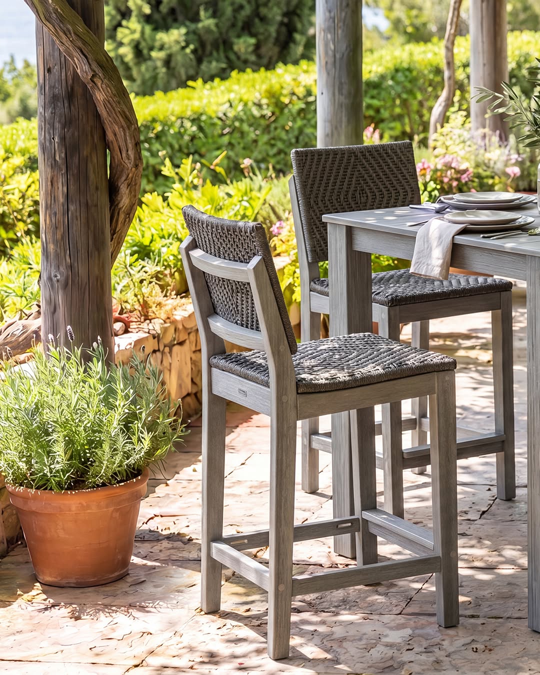 A quiet corner for elevated outdoor dining.

MAD Balcony Side Chairs in Heathered Stone with Carbon Diamond Woven Rope bring texture, comfort, and sculptural detail to any outdoor space. Paired with the Greenwich 36” Balcony Table in Heathered Stone, this set invites slow summer meals outdoors.

Enjoy outdoor living without compromise.

#GardenDining #OutdoorLiving #MadeForOutdoors #EnviroWood